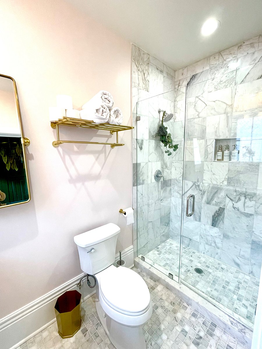 Independent third bedroom suite with kitchenette, king bed, and en suite bathroom. 