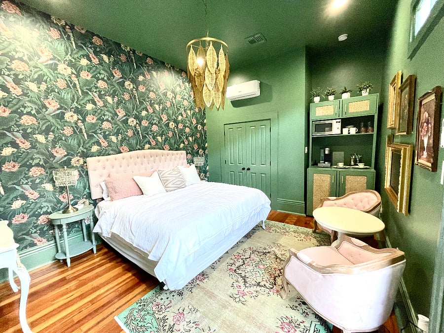 Independent third bedroom suite with kitchenette, king bed, and en suite bathroom. 