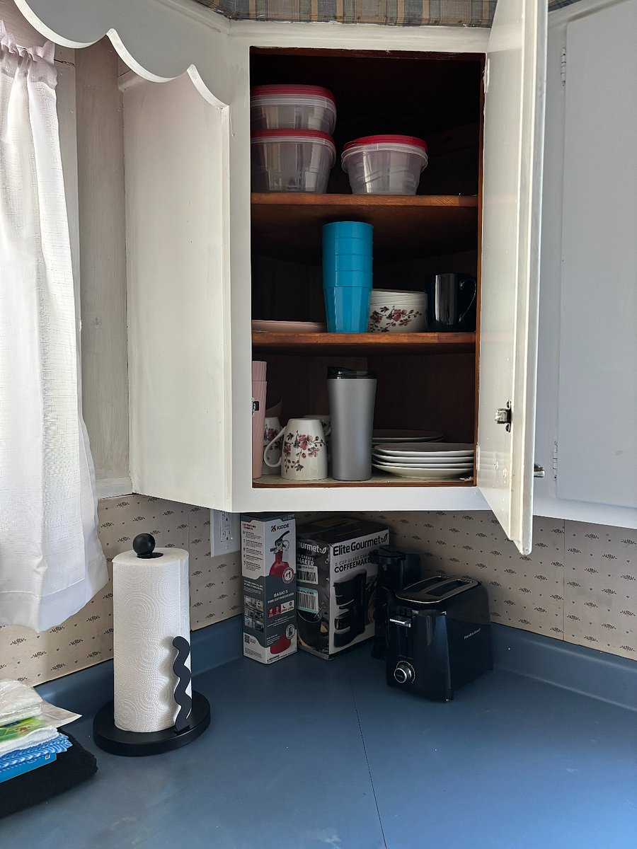 Fully stocked kitchen complete with cookware, utensils, dishes, pots and pans and silverware