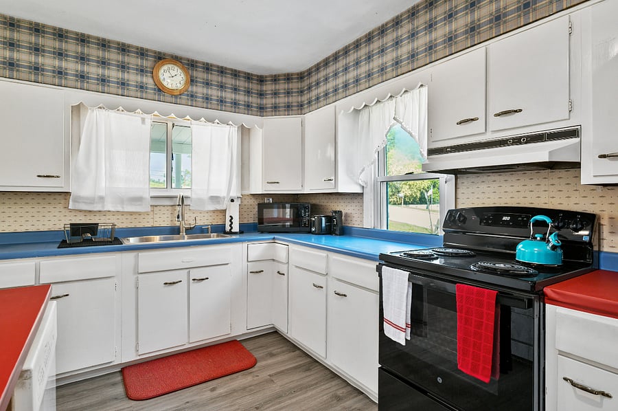 Updated kitchen complete with new appliances - electric stove, full size refrigerator