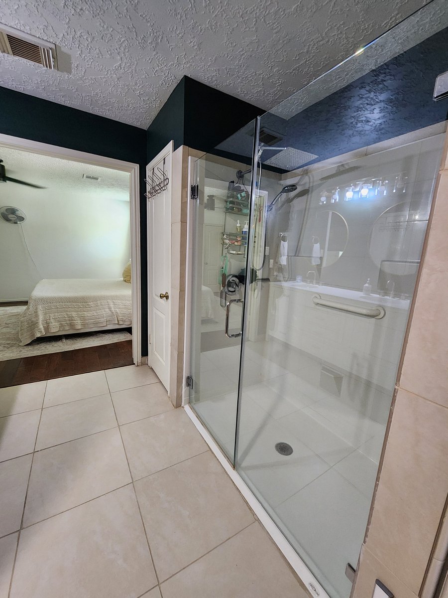 Master bath shower and linen closet downstairs