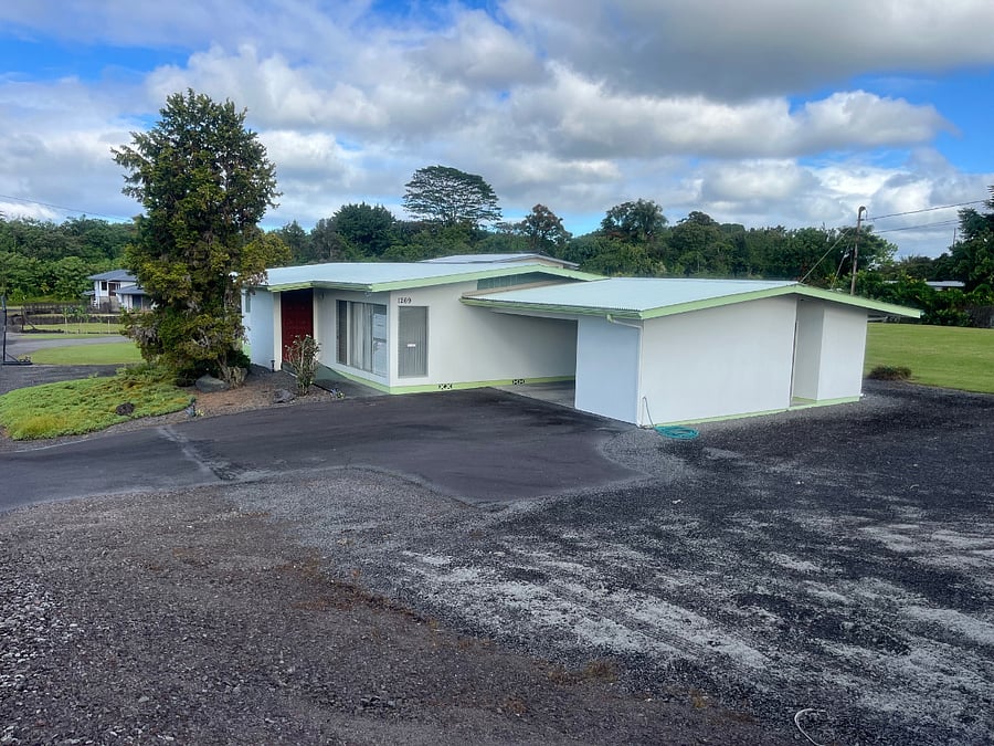 Easy-access home with convenient parking and a welcoming front approach.