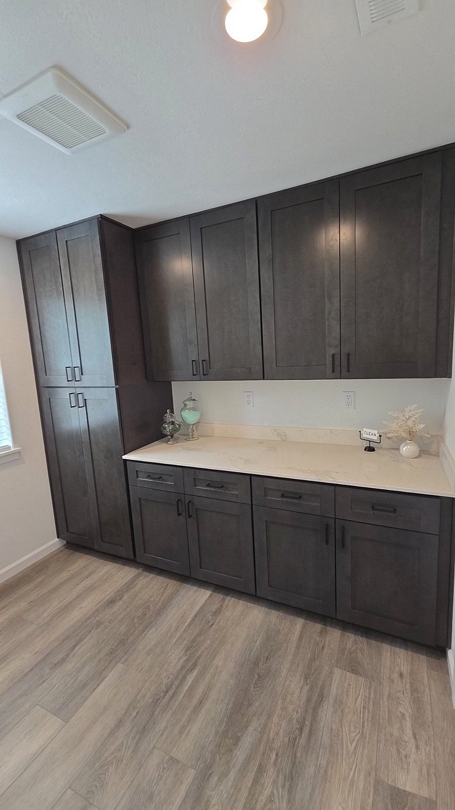 laundry room with extra storage space.