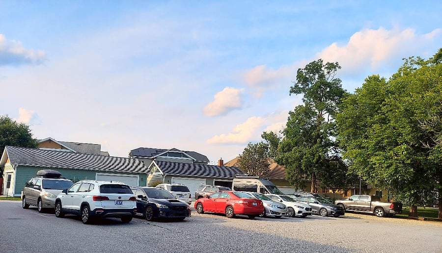 Permit-only parking lot located behind the townhome