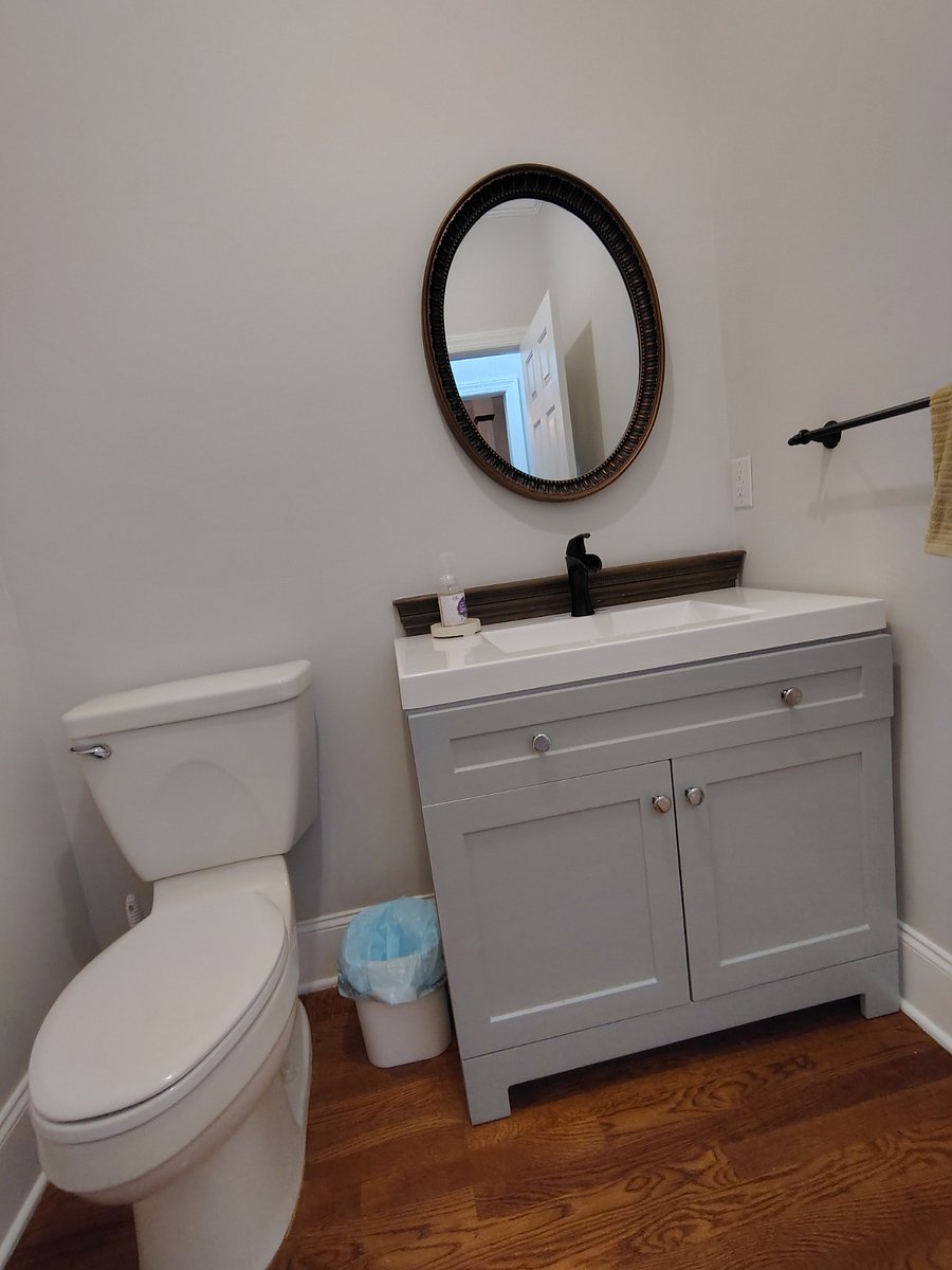 SHARED--large half bath located on main floor off the dining room