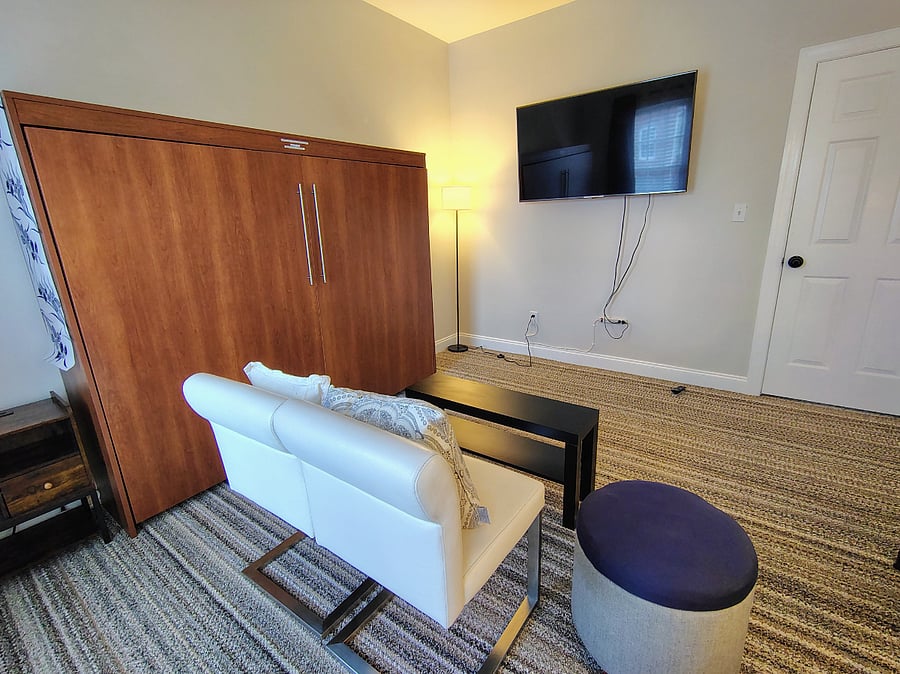 PARKVIEW-two chairs can be easily moved together to create a sitting area for watching your favorite shows on the large 55 inch smart tv