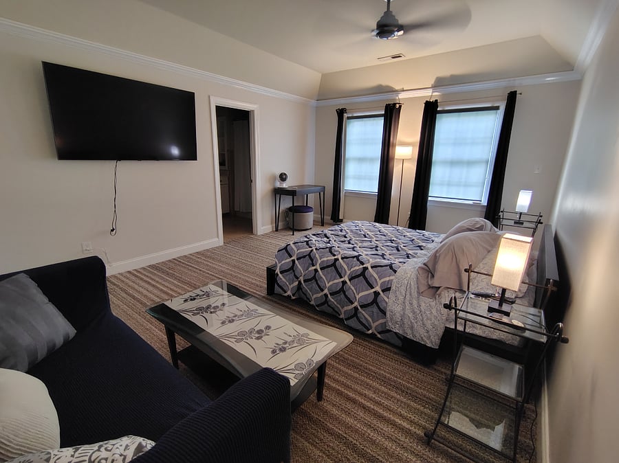 PIEDMONT--the large 65 inch smart tv can be viewed from comfort of your bed or from the loveseat