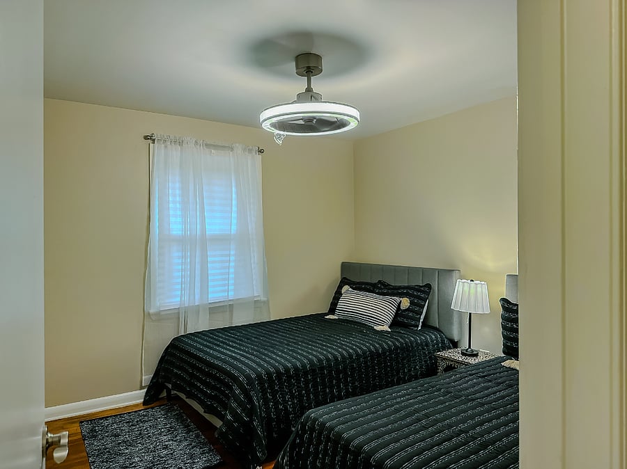 Bedroom 3: 2 full beds and lamp
