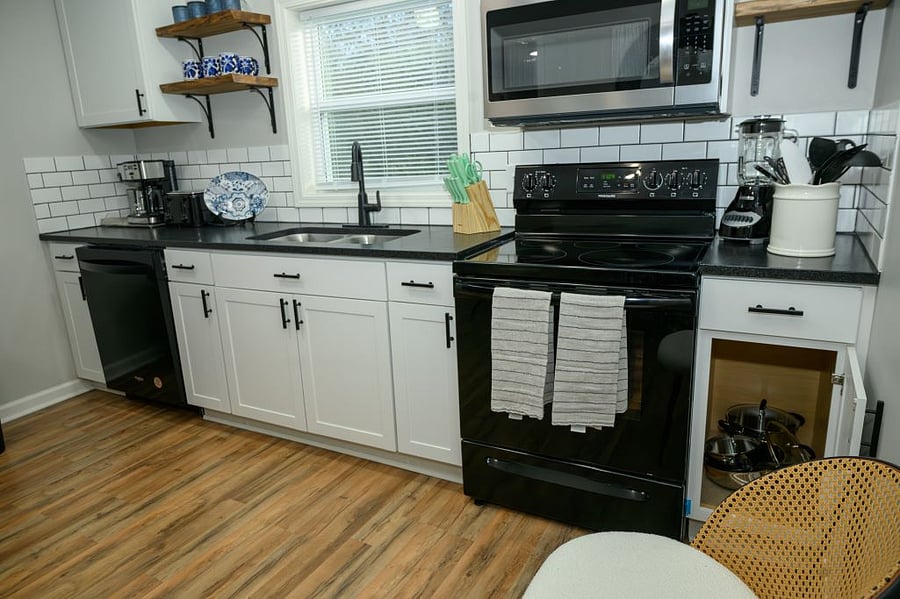 Spacious, modern kitchen. Hardwood flooring throughout the house helps keep things clean and modern.