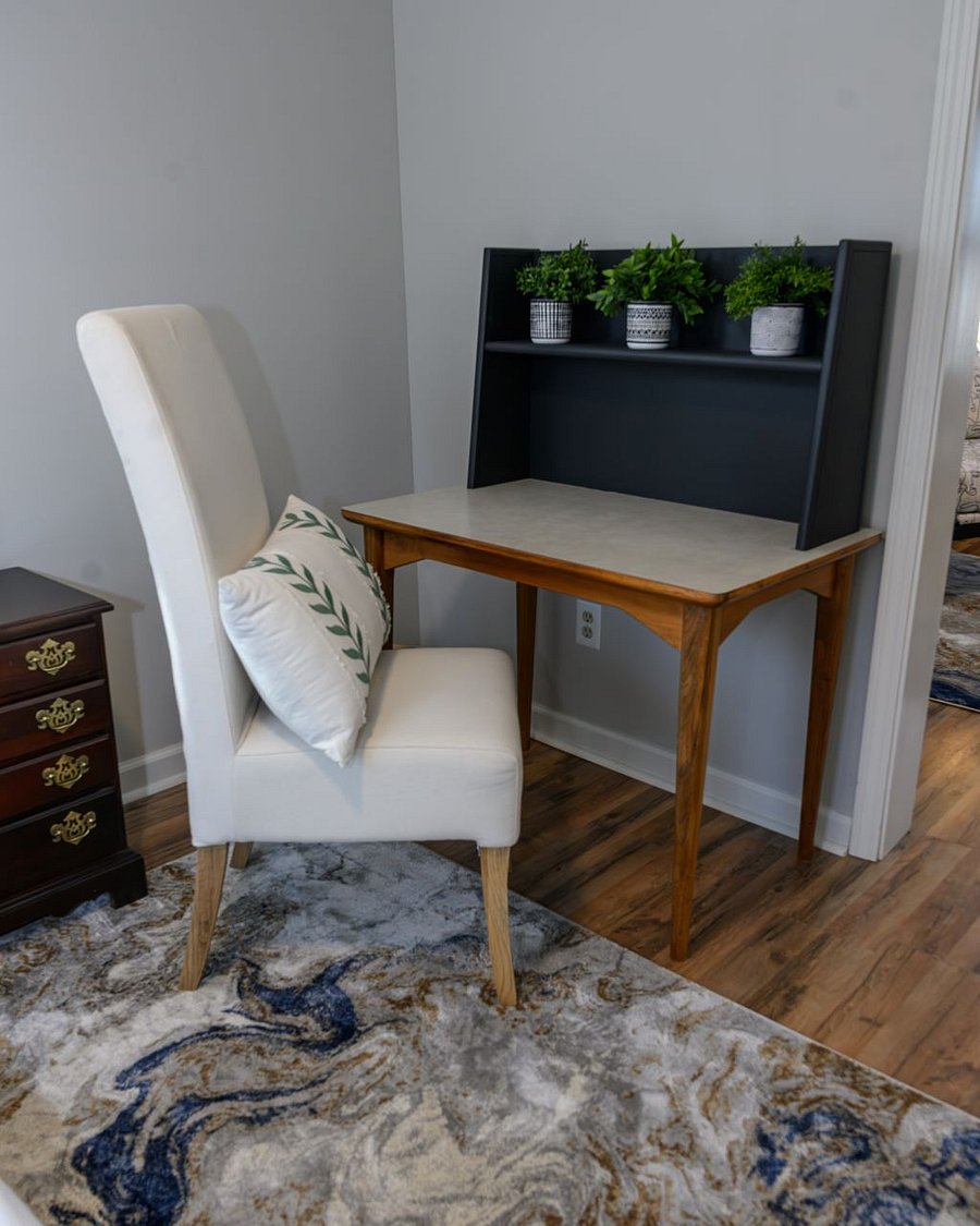 Work space with desk and plenty of plugs available. Enjoy the high speed internet.
