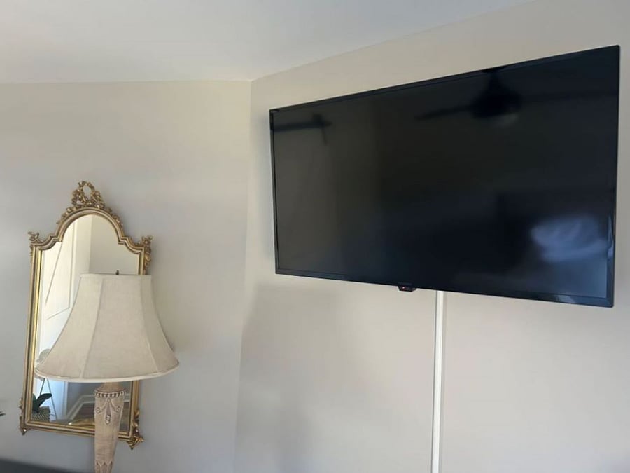 Watch your smart TV while lounging in the comfy queen bed