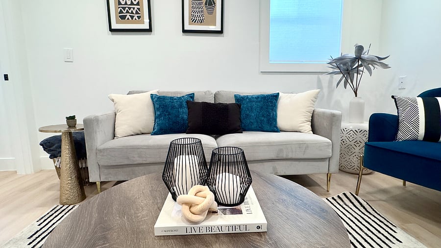 Relax on the cozy couch and enjoy your favorite shows on the 70-inch TV  perfect for movie nights or game day!