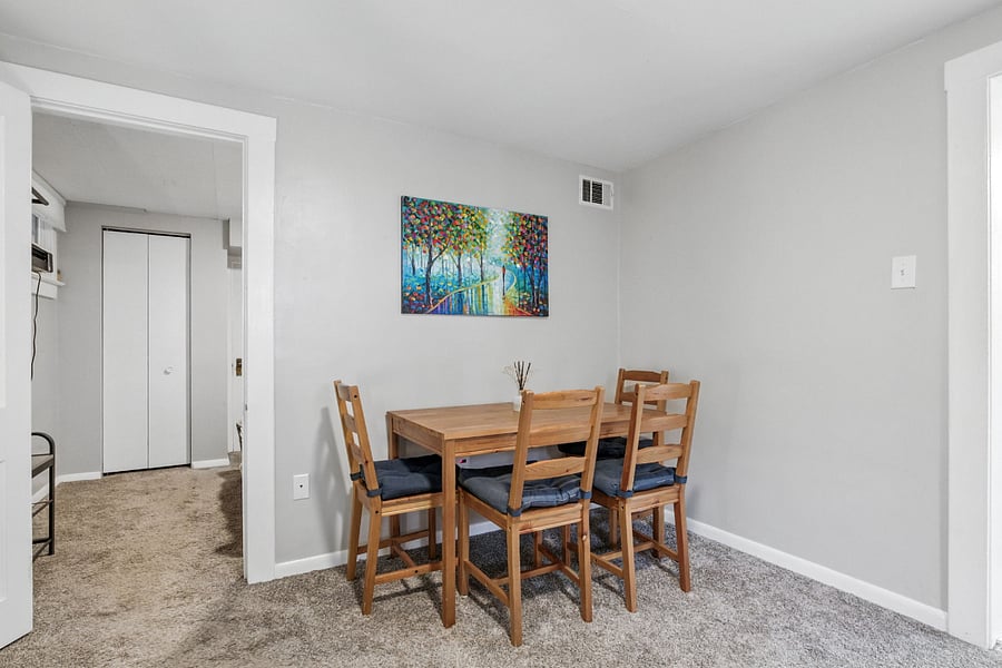 Living/dining room4 with bedroom door at left