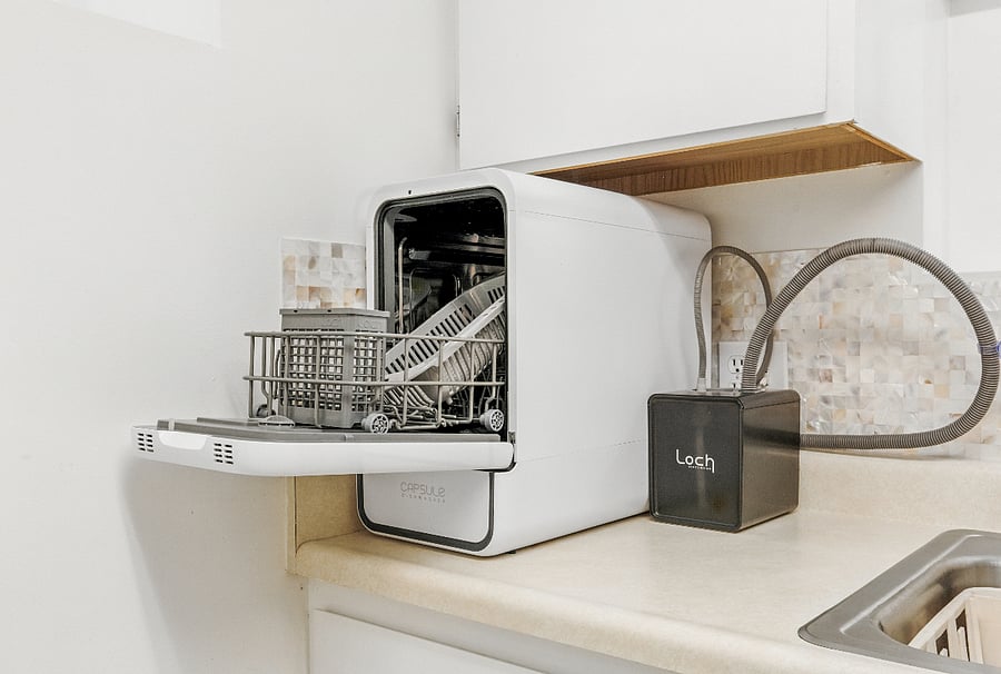Counter-top dishwasher by Loch, which focuses on sustainability. Has regular wash, UV, and fruit/veggies wash function