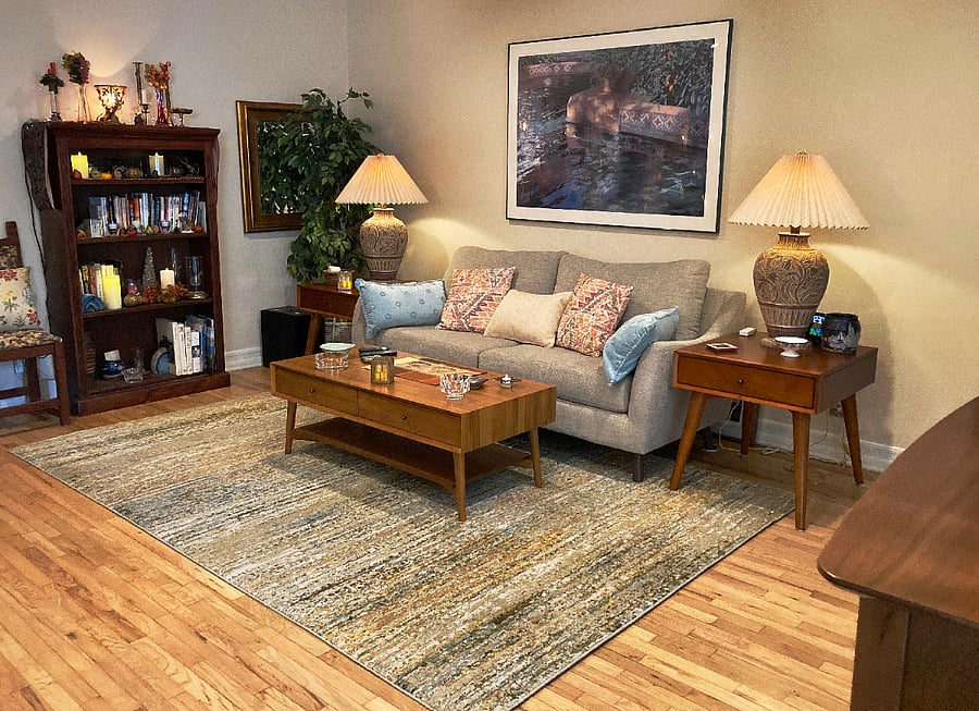 Living room east side. Seasonal decor changes quarterly.