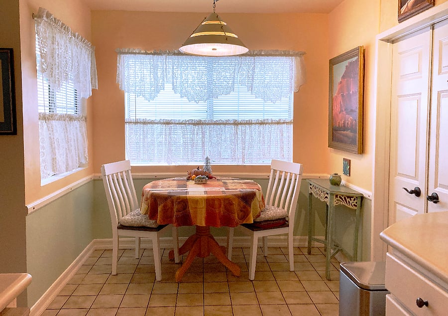 Sunny 'morning light' breakfast nook. White doors on right are to Owner's private den-office - not a common area.
