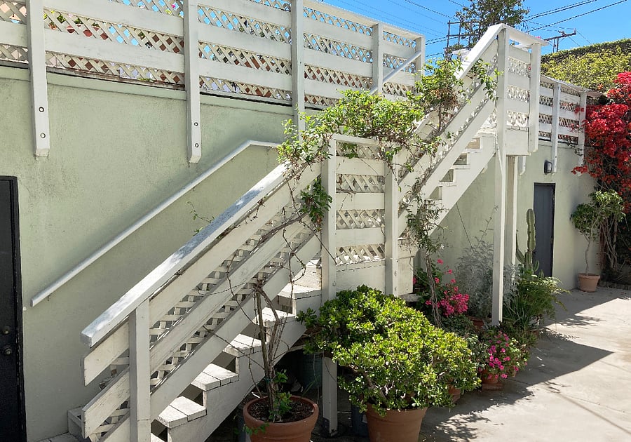 Patio stairs to garage roof deck.