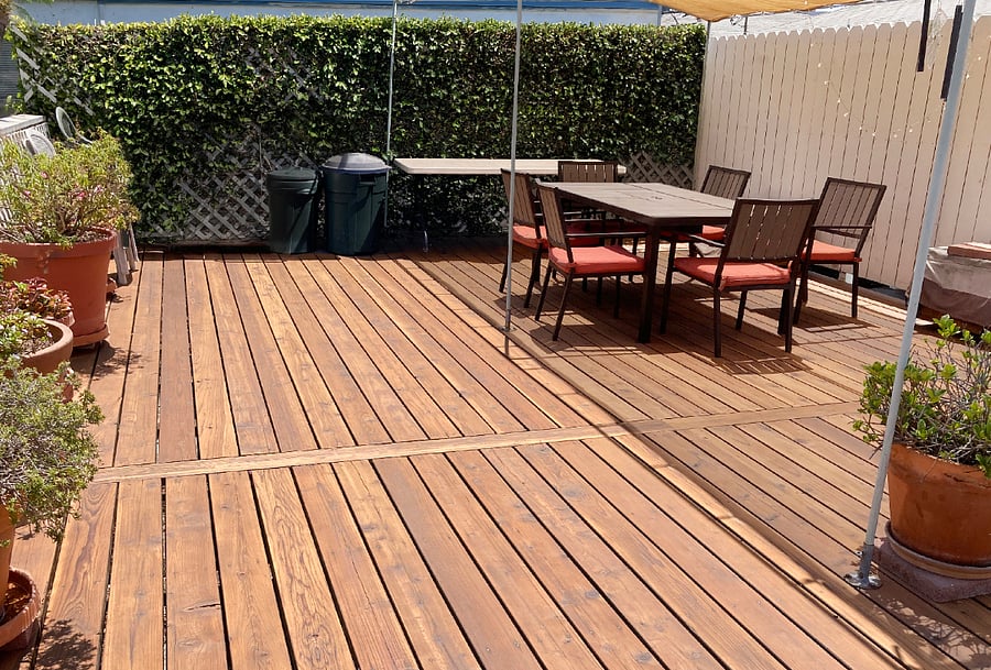 Deck south - table & 6 chairs. No BBQ (fire insurance mandate). No smoking any kind on deck - SM City code.