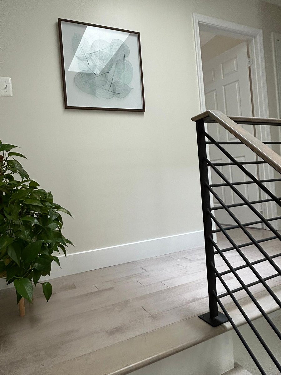 Top of stairs leading up to 2nd floor where the rooms are.