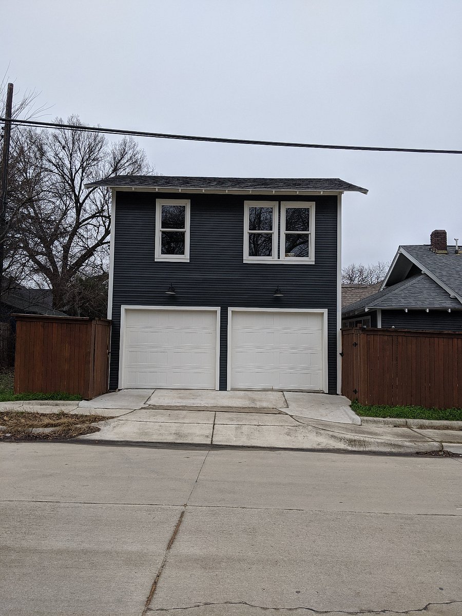 Exterior from across the street. Privacy gated entrance on the left side. Abundant parking.