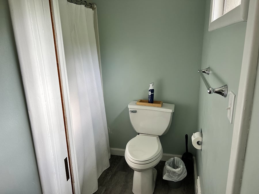 Bathroom 1: Full bath with dual sinks, shower/tub combo and toilet