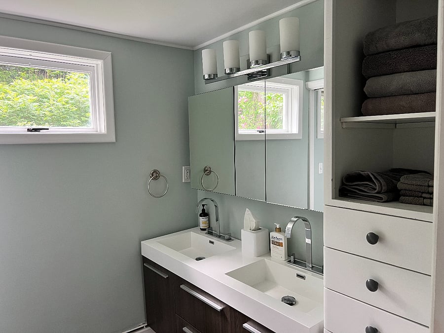 Bathroom 1: Full bath with dual sinks, shower/tub combo and toilet