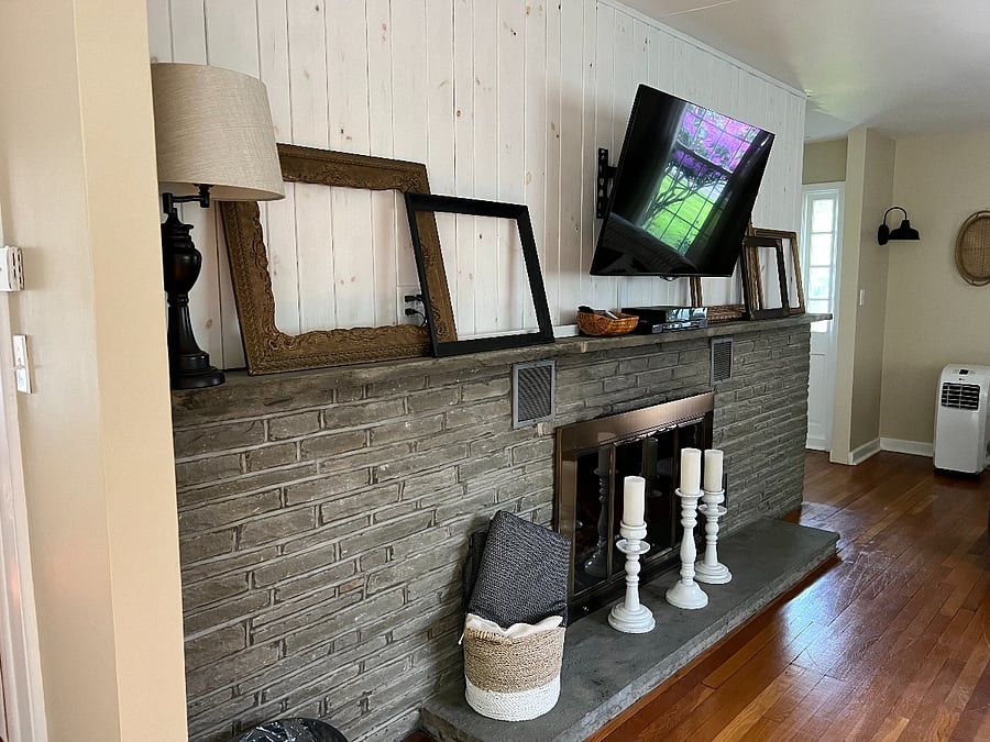 Main living area with TV, fire place and seating for 10
