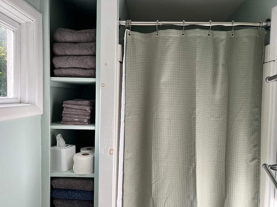 Bathroom 2: Full bath with toilet, sink and shower stall