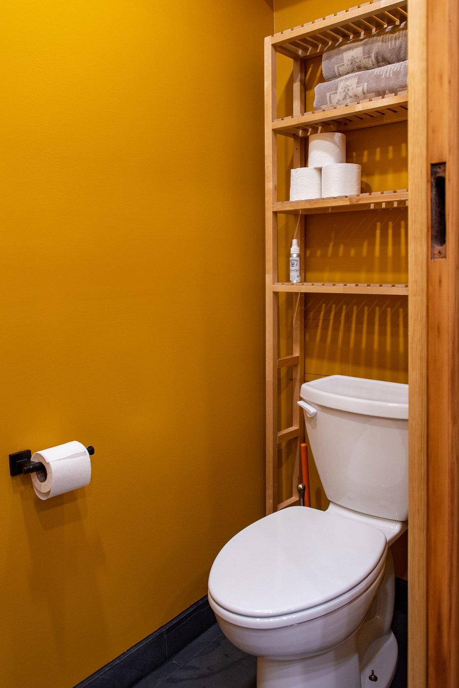 Toilet pocket with additional toiletries