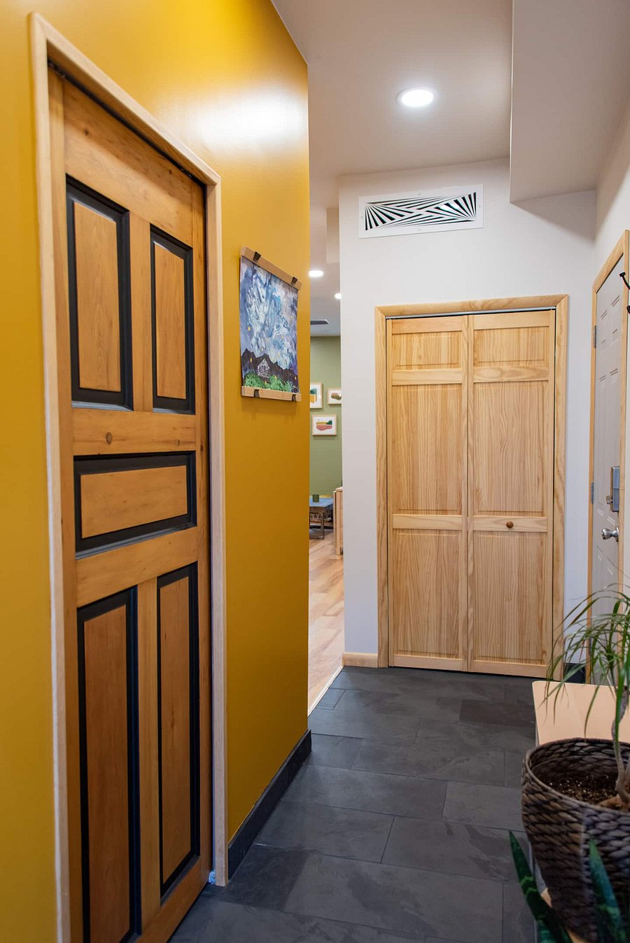 Hallway with closet right next to main apartment entrance