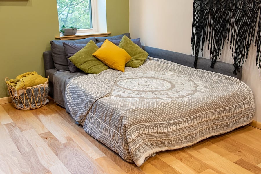 Example of bed made on pullout couch