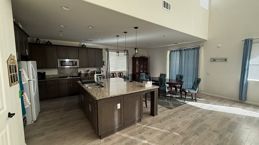 Open concept kitchen, living room, and dining room.