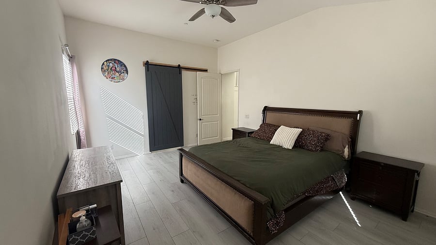 master bedroom with cal-king bed