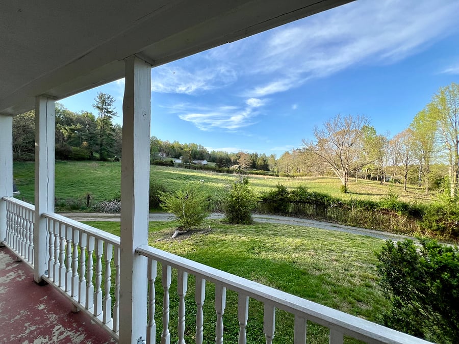 Beautiful front porch to relax. Great views