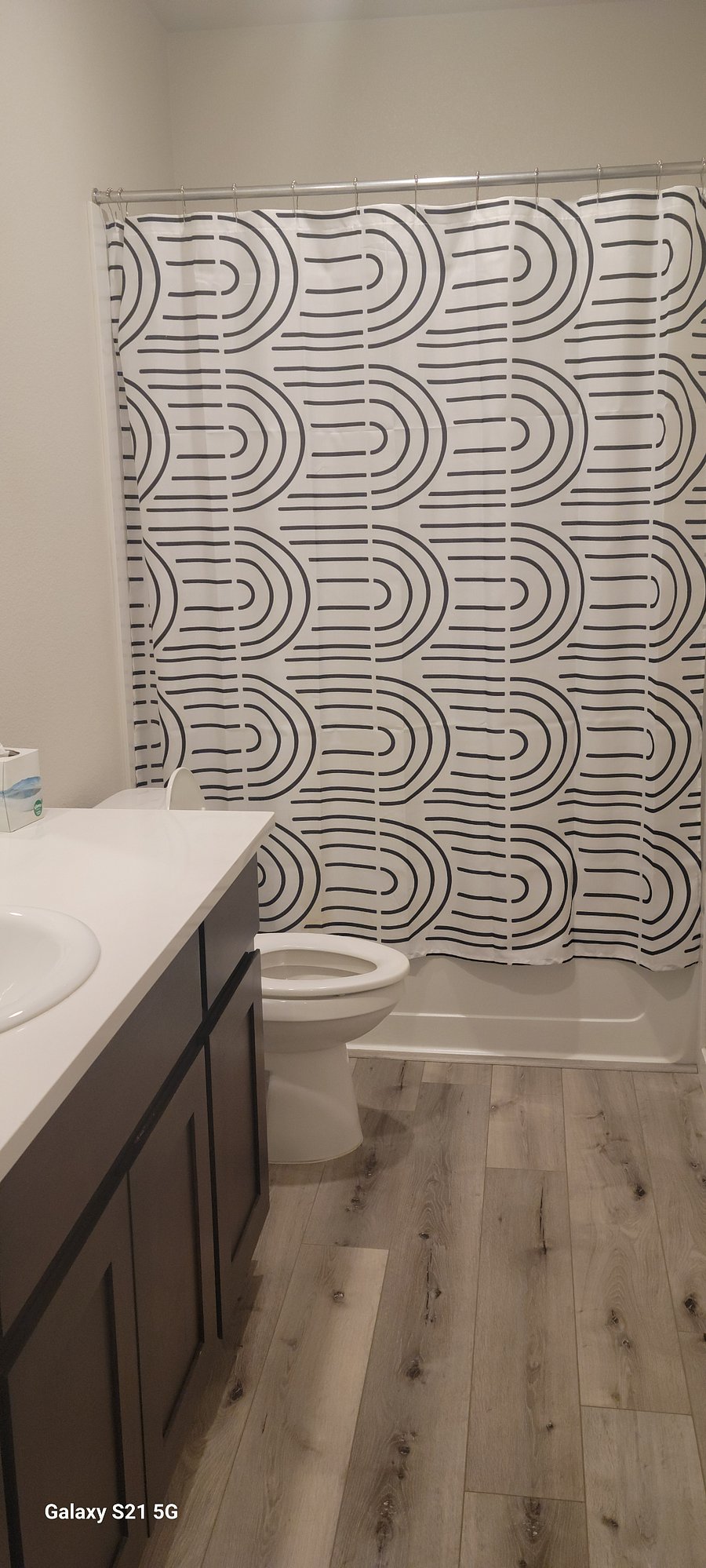 Upstairs Bathroom with bath and shower