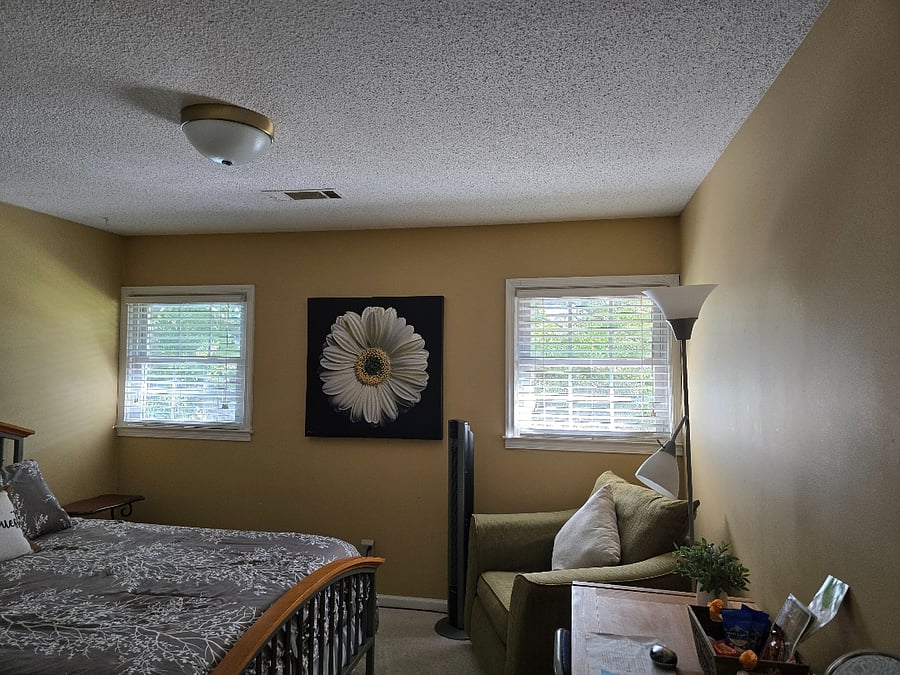 This the room for our travelers, queen bed, desk and comfortable chair.