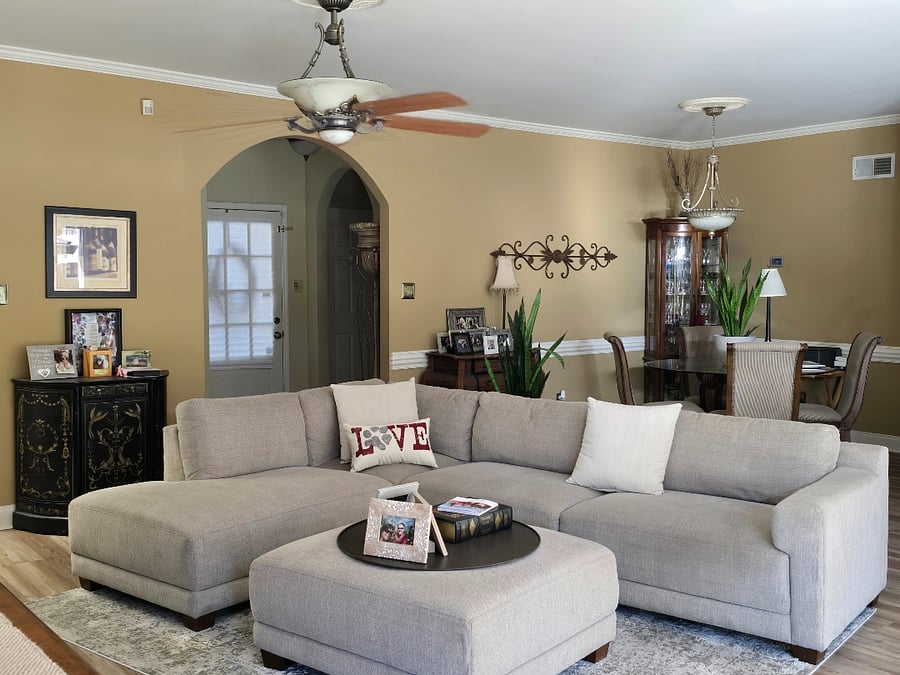 Living room showing our front entry area which is how you will enter. Please note, you must be able to navigate stairs with two landings to get to your room and private bathroom upstairs.