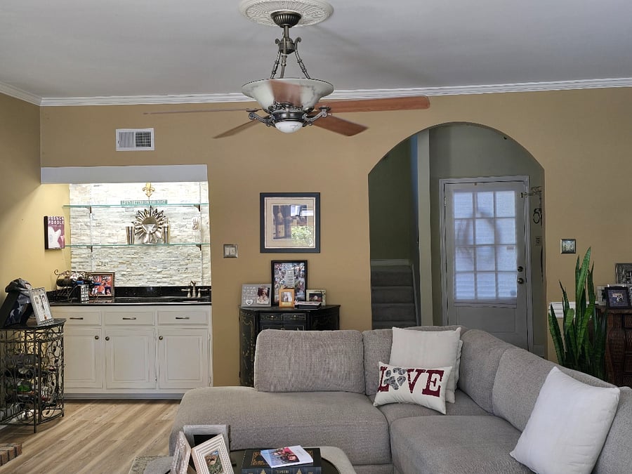 Wet bar area and entry at the front door. The stairs are to the left of the door in this picture.