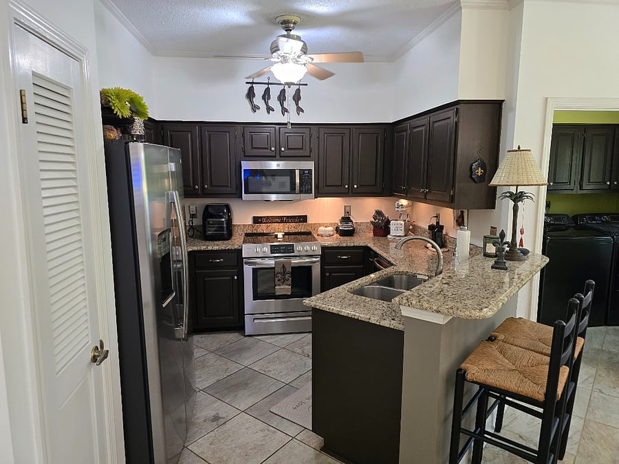 Our kitchen we have coffee here we have a Keurig that makes by the cup or a full pot! If you drink a lot of coffee please chip in on the coffee!