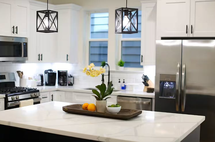 Clean, bright, chef's kitchen complete with dishwasher, gas stove, ice maker, and garbage disposal. Coffee bar includes a Keurig, French press with electric kettle, and a programmable coffee maker! Plenty of other appliances including a crockpot. 
