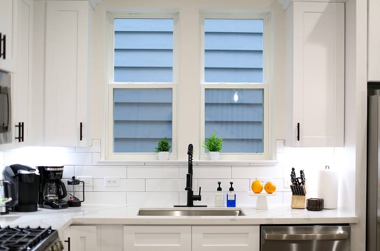 Clean, bright, chef's kitchen complete with dishwasher, gas stove, ice maker, and garbage disposal. Coffee bar includes a Keurig, French press with electric kettle, and a programmable coffee maker! Plenty of other appliances including a crockpot. 