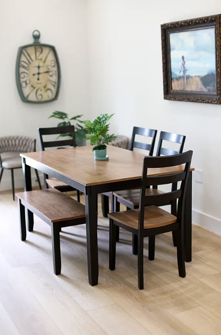 Dining table for six. Also, four barstools at the kitchen counter, and a table for four outside on the patio!