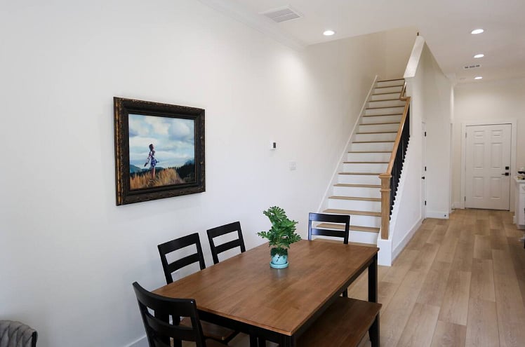 Dining table for six. Also, four barstools at the kitchen counter, and a table for four outside on the patio!