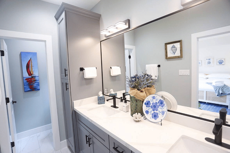 Spacious & modern en suite bathroom for Bedroom One. Includes walk-in shower & beautiful double vanity with plenty of counter space. Each bathroom contains a hair dryer, shampoo, conditioner, body wash, and hand soap.