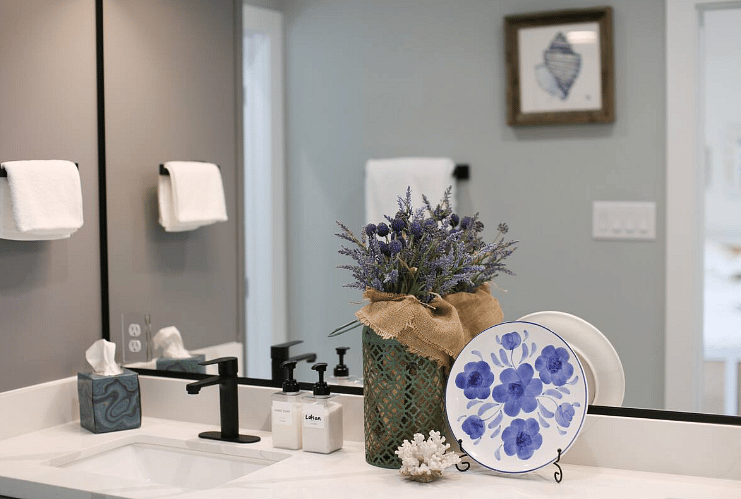 Spacious & modern en suite bathroom for Bedroom One. Includes walk-in shower & beautiful double vanity with plenty of counter space. Each bathroom contains a hair dryer, shampoo, conditioner, body wash, and hand soap.
