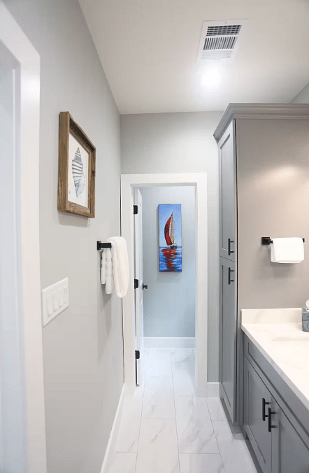 Spacious & modern en suite bathroom for Bedroom One. Includes walk-in shower & beautiful double vanity with plenty of counter space. Each bathroom contains a hair dryer, shampoo, conditioner, body wash, and hand soap.
