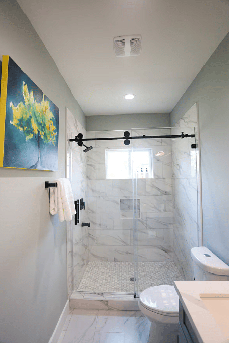 Spacious & modern en suite bathroom for Bedroom Four. Includes walk-in shower & beautiful vanity with plenty of counter space. Each bathroom contains a hair dryer, shampoo, conditioner, body wash, and hand soap.