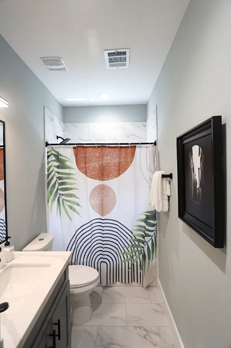 Spacious bathroom for Bedrooms Two & Three with a tub shower for bathing your children or just relaxing in a warm bath! Each bathroom contains a hair dryer, shampoo, conditioner, body wash, and hand soap.