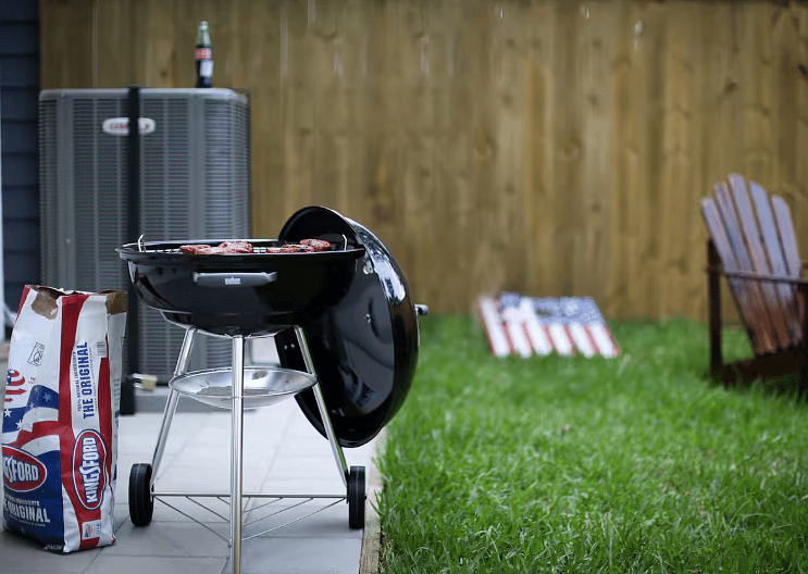 Relax on the back patio  with a firepit, charcoal grill, table & chairs, games, and a privacy fenced back yard. Pet-friendly!