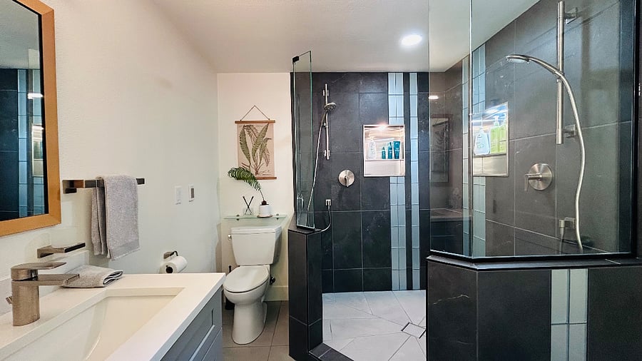 Luxury ensuite double shower bathroom with underfloor radiant heating